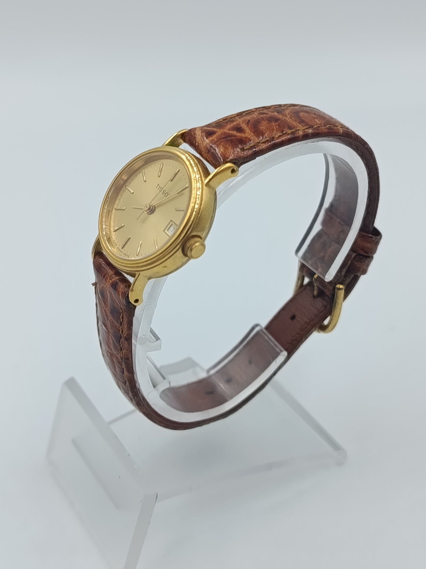 Elegante Tissot Damenarmbanduhr Goldfarben mit Datumsanzeige Lederband
