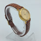 Elegante Tissot Damenarmbanduhr Goldfarben mit Datumsanzeige Lederband