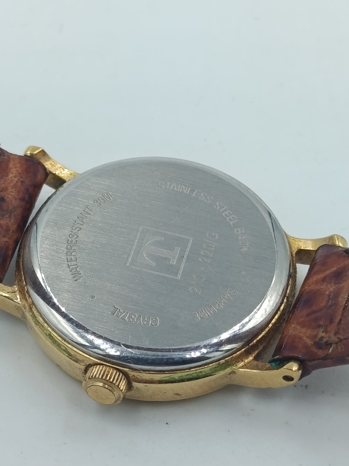 Elegante Tissot Damenarmbanduhr Goldfarben mit Datumsanzeige Lederband