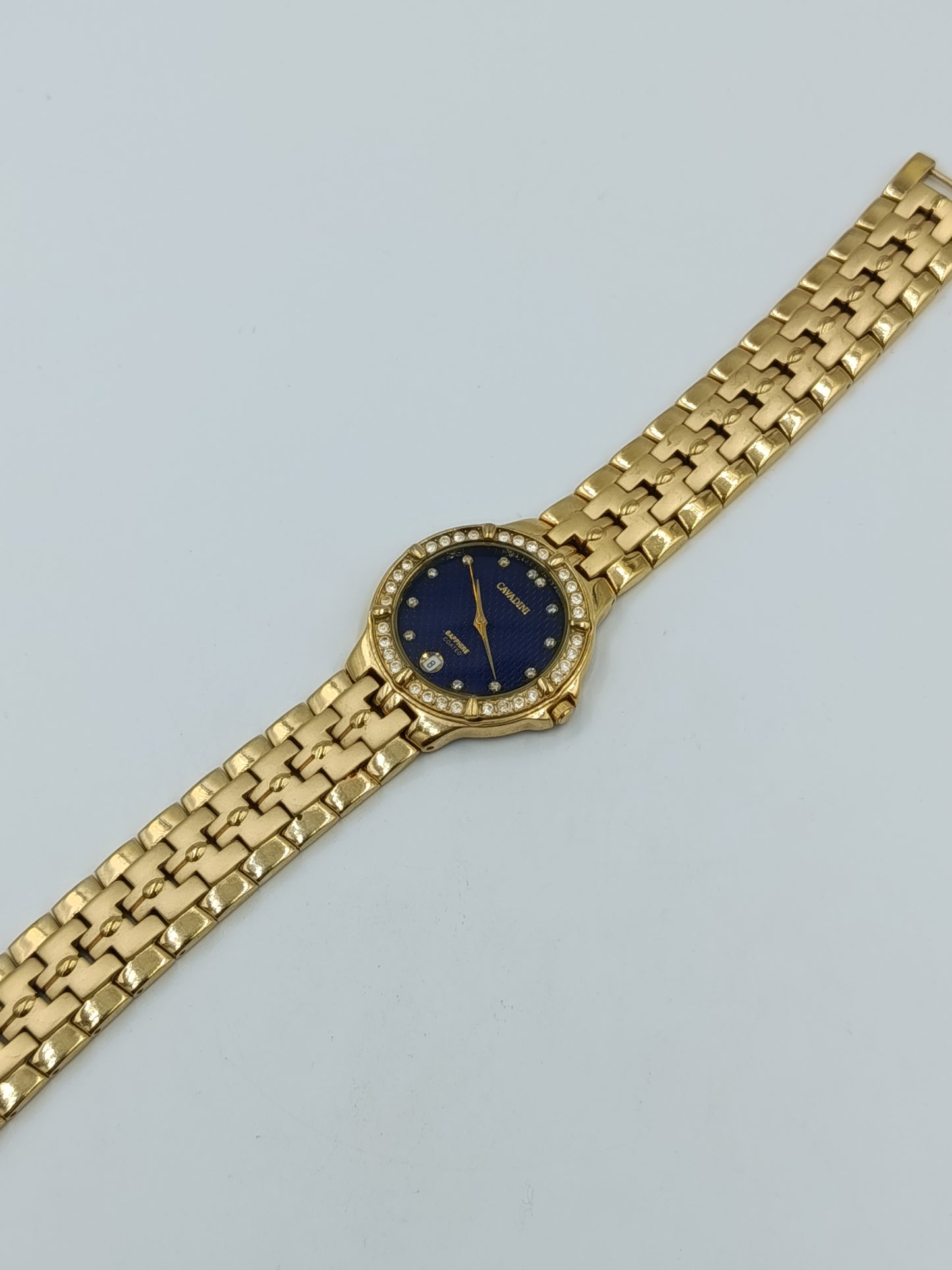 Cavadini Damen Armbanduhr in Goldoptik mit blauem Zifferblatt und Ziersteinen
