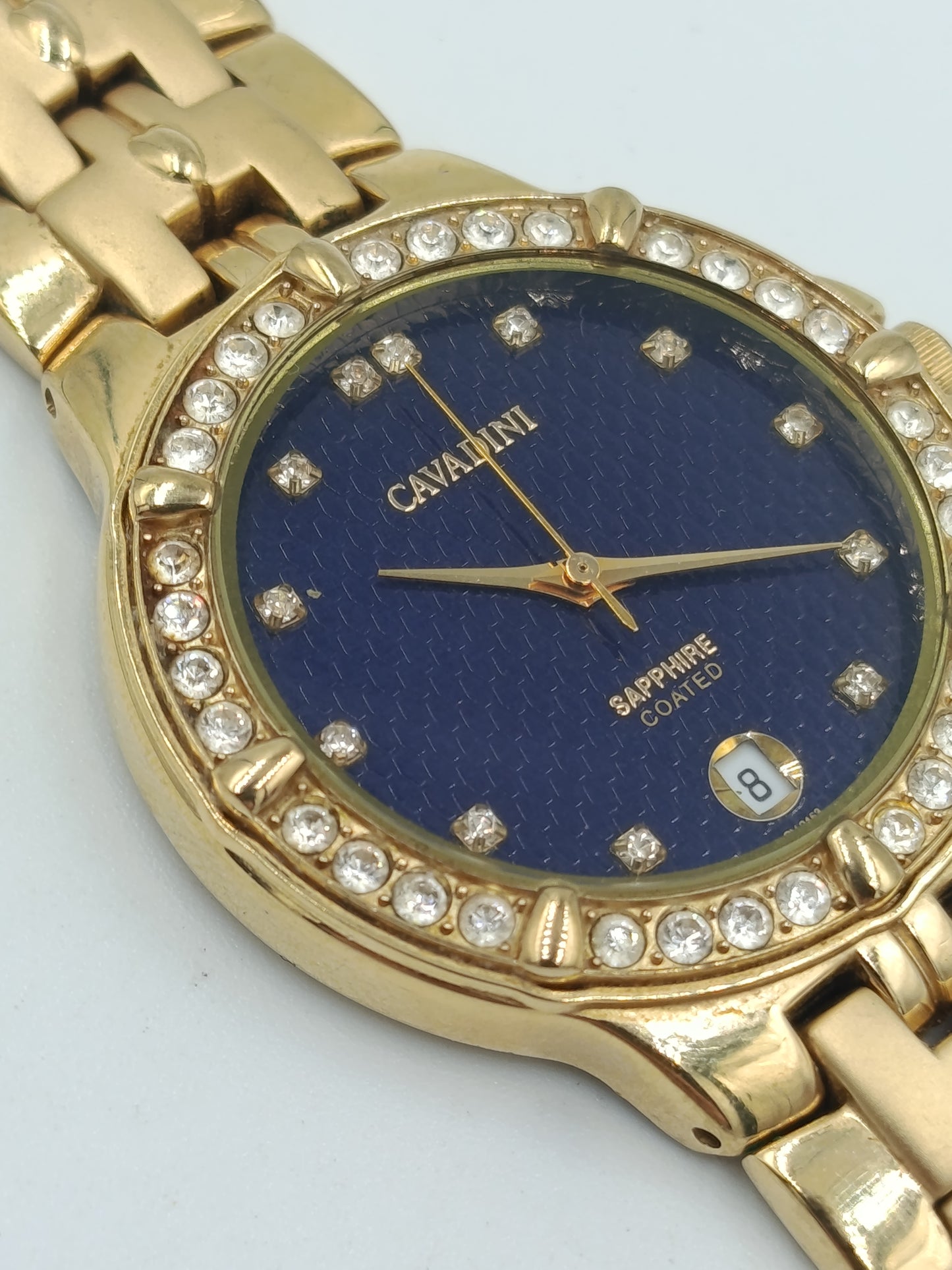 Cavadini Damen Armbanduhr in Goldoptik mit blauem Zifferblatt und Ziersteinen