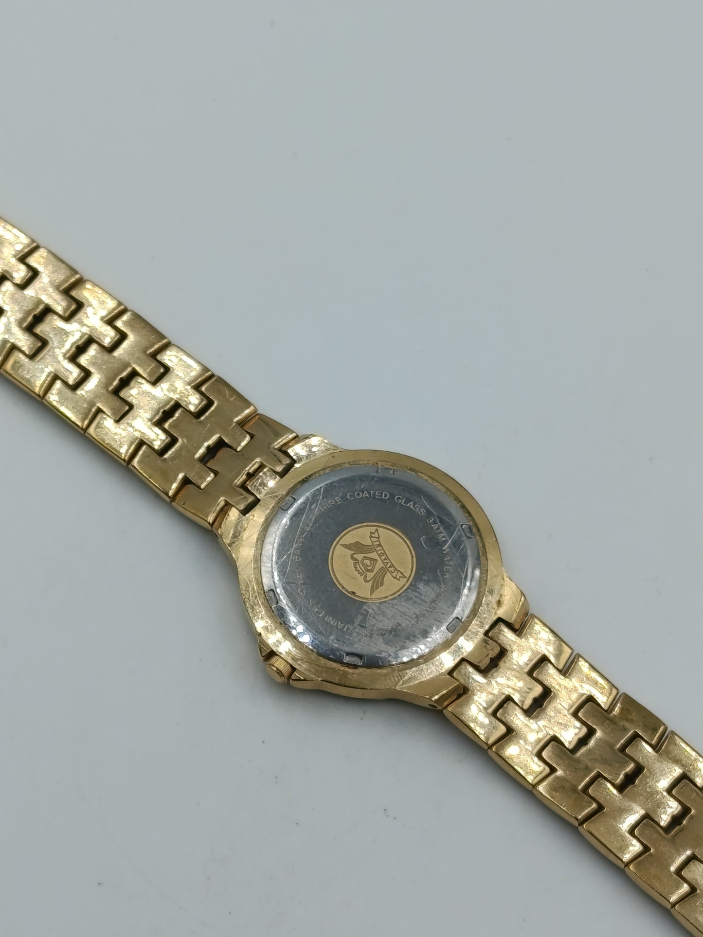 Cavadini Damen Armbanduhr in Goldoptik mit blauem Zifferblatt und Ziersteinen