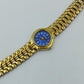 Elegante Geneva Uhr Goldfarben – Blaues Zifferblatt & Metall