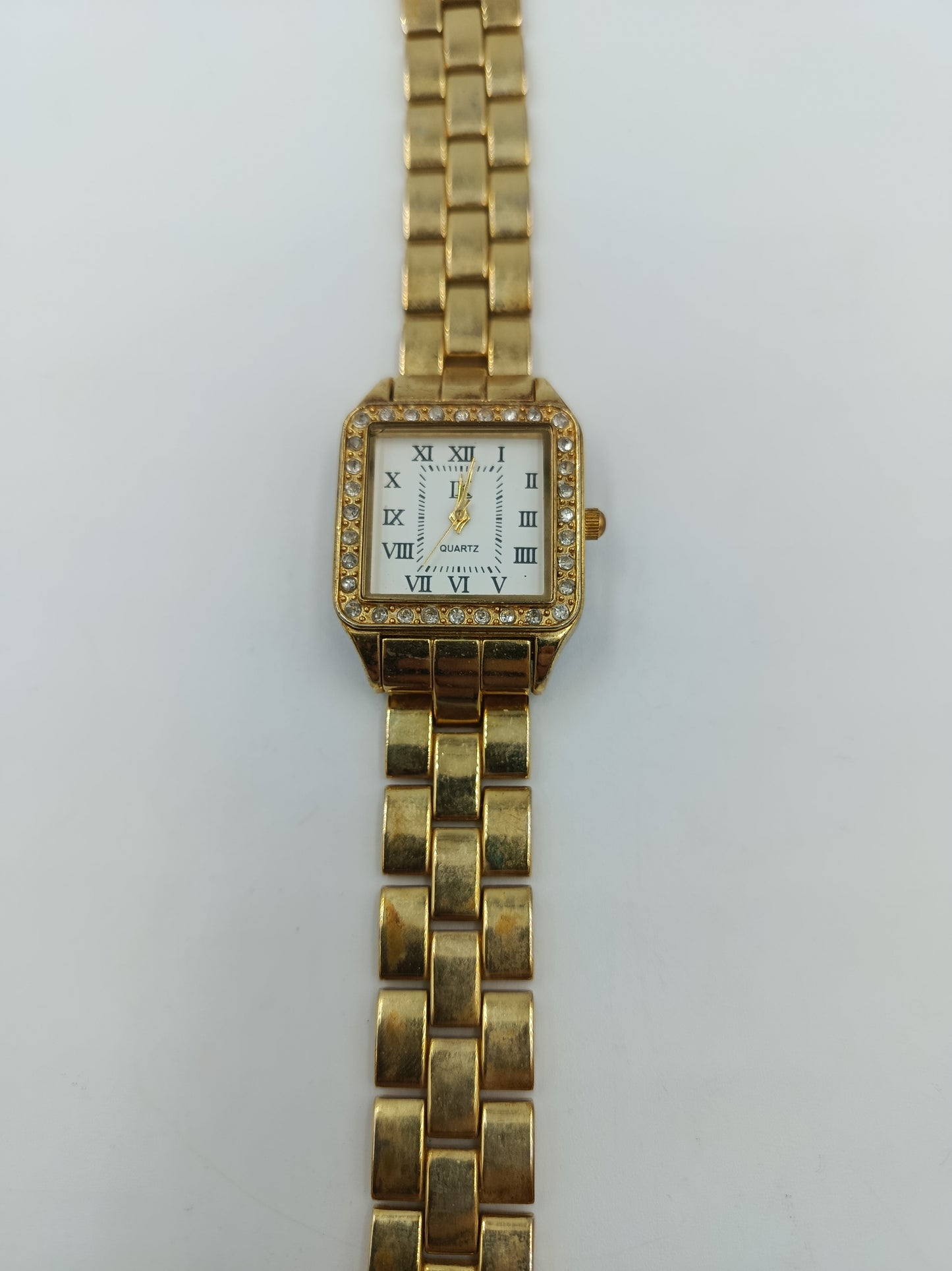 Vintage Damenarmbanduhr Goldfarben mit Strassbesatz und römischen Ziffern