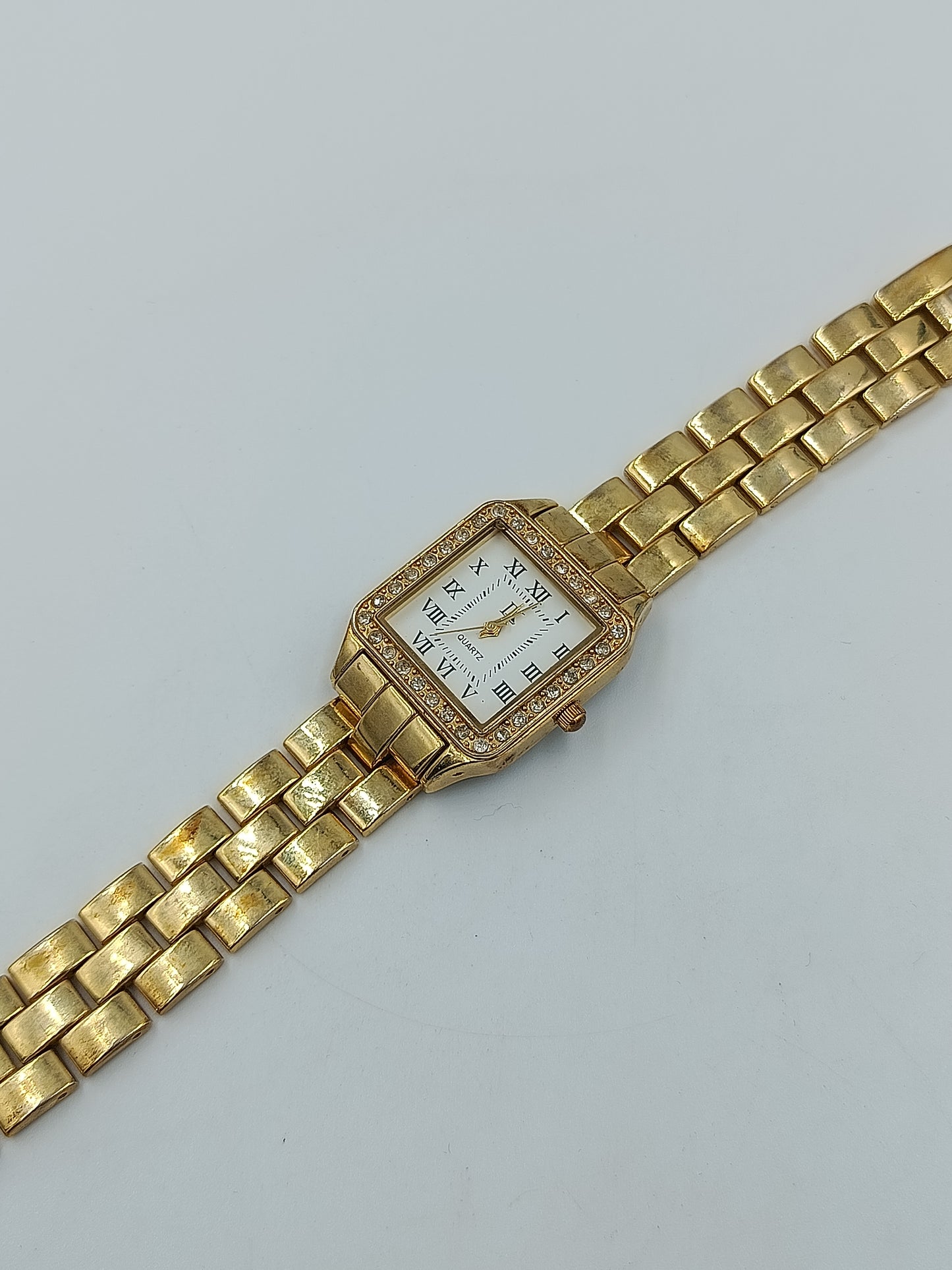 Vintage Damenarmbanduhr Goldfarben mit Strassbesatz und römischen Ziffern
