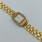 Vintage Damenarmbanduhr Goldfarben mit Strassbesatz und römischen Ziffern