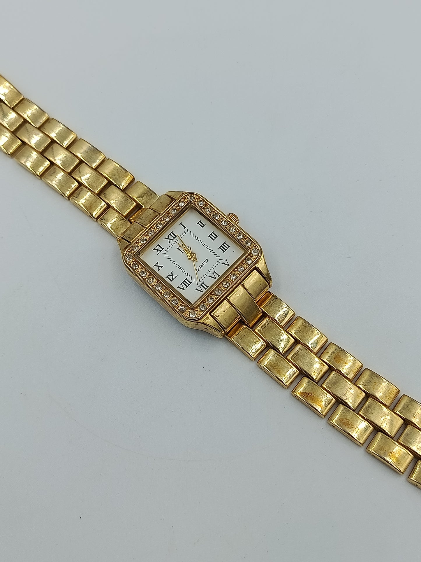 Vintage Damenarmbanduhr Goldfarben mit Strassbesatz und römischen Ziffern
