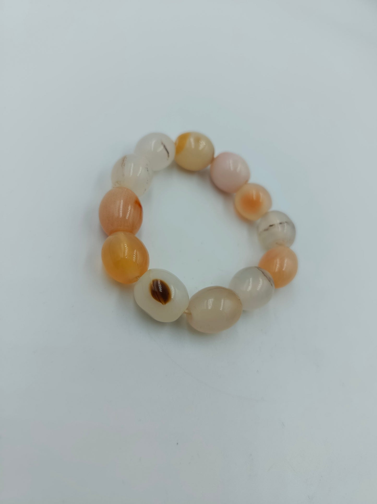 Perlen Armband elastisch: Dekorativ in Creme & Apricot