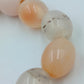 Perlen Armband elastisch: Dekorativ in Creme & Apricot