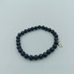 Elastisches Lava Stein Armband in Schwarz mit Anhänger von enso