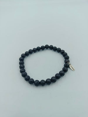 Elastisches Lava Stein Armband in Schwarz mit Anhänger von enso