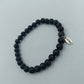 Elastisches Lava Stein Armband in Schwarz mit Anhänger von enso