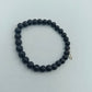 Elastisches Lava Stein Armband in Schwarz mit Anhänger von enso