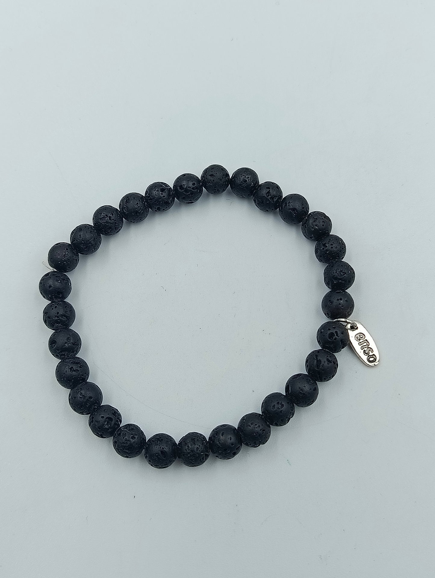 Elastisches Lava Stein Armband in Schwarz mit Anhänger von enso