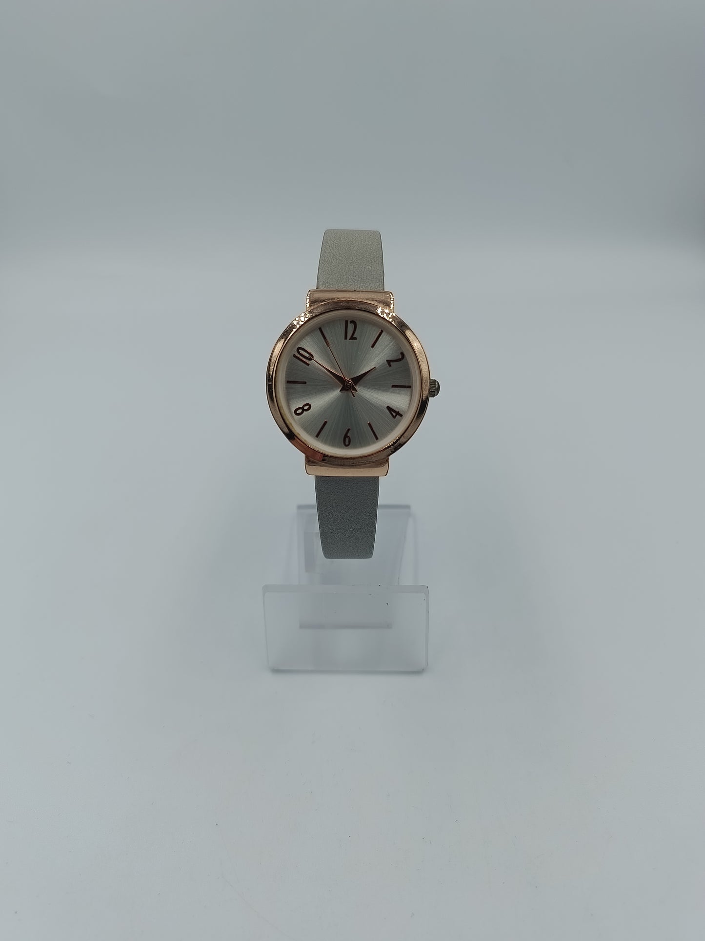 Elegante Damen Armbanduhr in Roségold Optik mit grauem Lederarmband