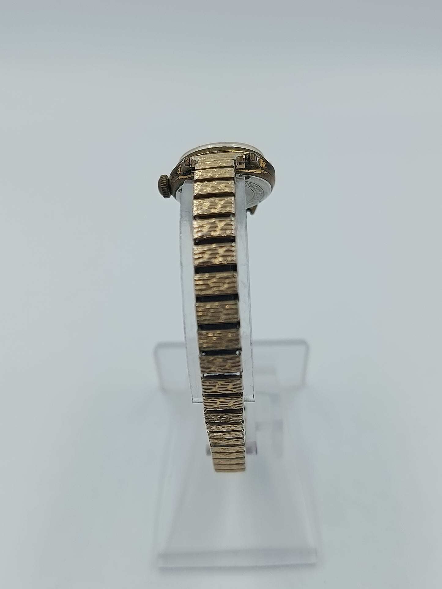 Klassische  Bergana Damen Armbanduhr in Goldoptik mit elastischem Metallarmband