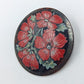 Wunderschöne runde Vintage Brosche mit handbemaltem Blumenmotiv in Rot