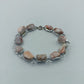 Elegantes Armband mit marmorierten Steinelementen in Rosé Creme Silberfarben
