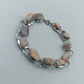Elegantes Armband mit marmorierten Steinelementen in Rosé Creme Silberfarben