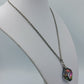 Elegante 835 Silberkette mit facettiertem Anhänger in schillernder Optik