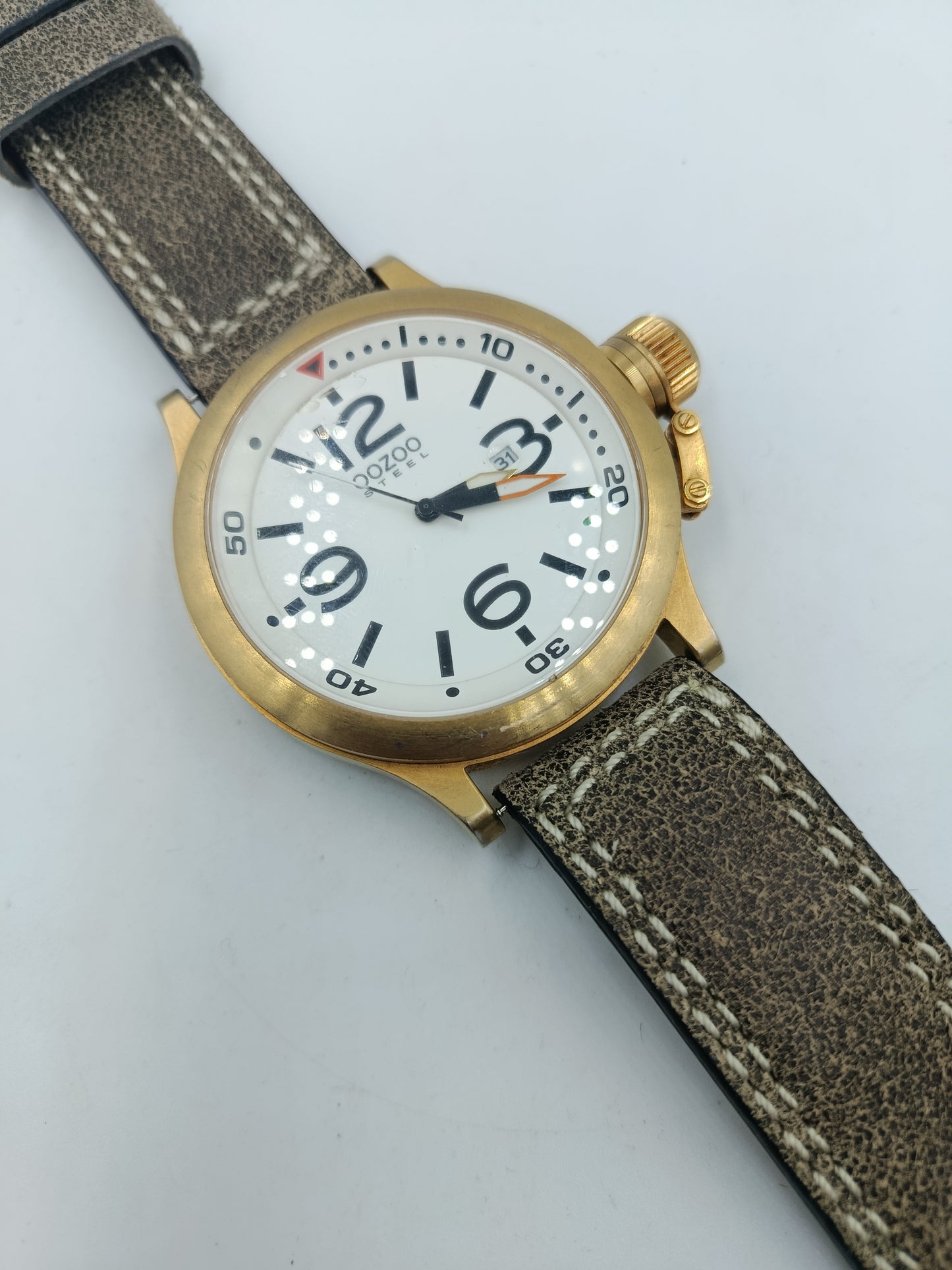 OOZOO Steel Armbanduhr Goldfarben Lederarmband Datum Herren Uhr Defekt