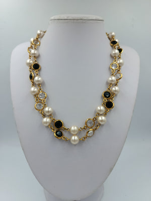 Elegante Perlenkette goldfarben mit schwarzen und klaren Steinen Vintage Stil