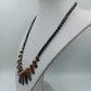 Ausdrucksstarke Statement Kette Hämatit Look mit Koralle Design modern