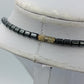 Ausdrucksstarke Statement Kette Hämatit Look mit Koralle Design modern