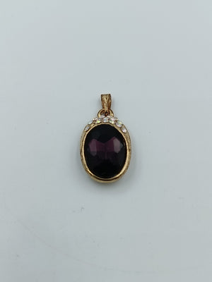 Vintage Anhänger Goldfarben mit dunkelrotem Stein Strassbesatz oval
