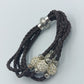 Vintage Lederarmband braun geflochten mit Strass Perlen und Magnetverschluss