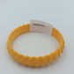 Vintage Armreif in Gelb  dekoratives Kunststoff Armband im Retro Design