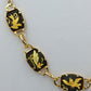 Vintage Collier mit schwarzem Emaille und goldfarbenen Vogelmotiven