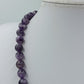 Elegante Vintage-Halskette aus violetten Kugelperlen in klassischem Design