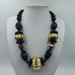 Statement Kette Schwarz Gold große Perlen  Design Elemente