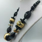 Statement Kette Schwarz Gold große Perlen  Design Elemente