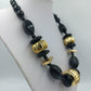 Statement Kette Schwarz Gold große Perlen  Design Elemente