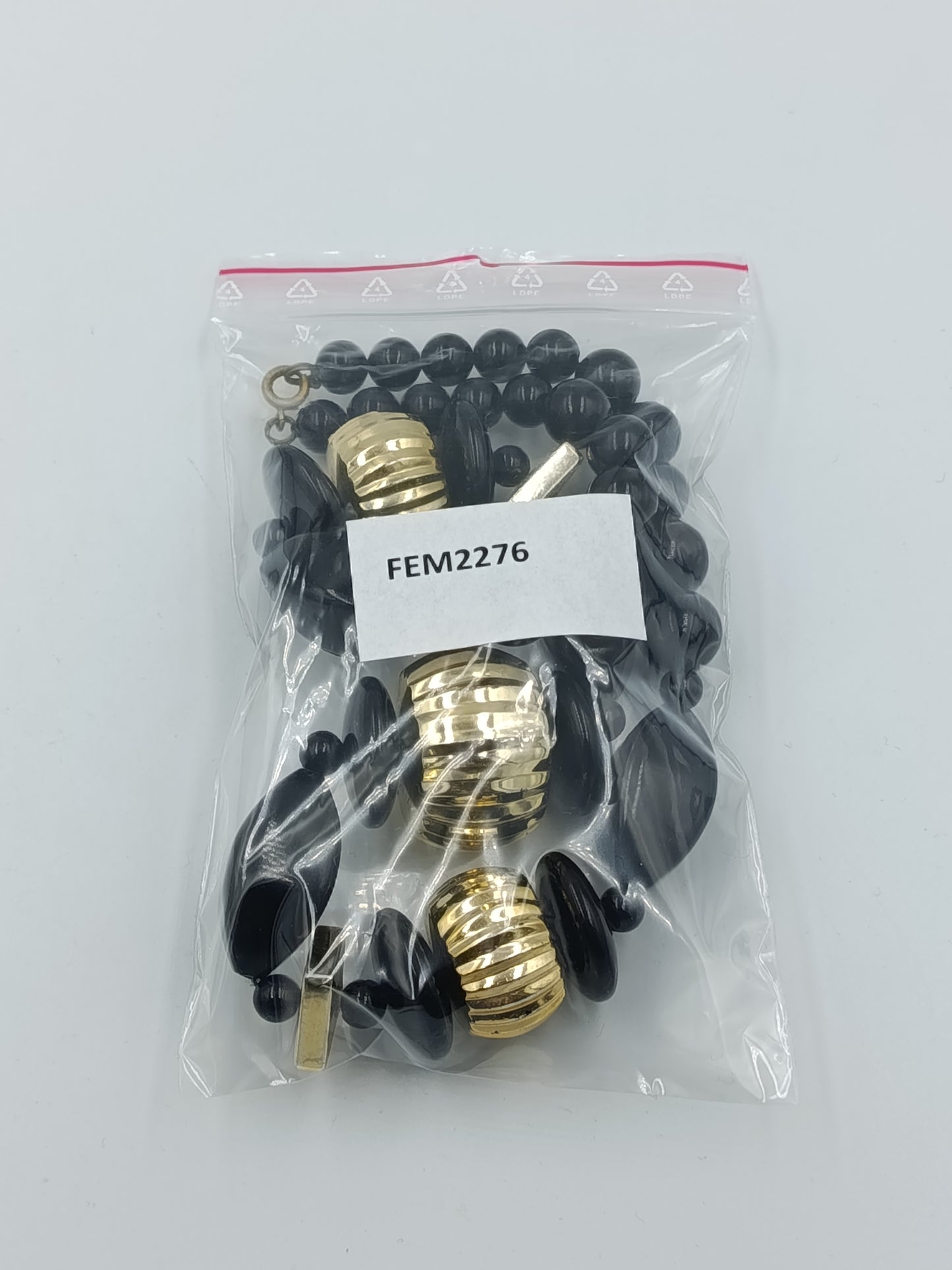 Statement Kette Schwarz Gold große Perlen  Design Elemente