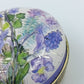 Charmante Vintage Pillendose mit Blumenmotiv rund