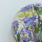 Charmante Vintage Pillendose mit Blumenmotiv rund