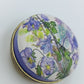 Charmante Vintage Pillendose mit Blumenmotiv rund