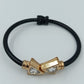 Vintage Armreif schwarz gold mit Strass geometrisch 6,5 cm