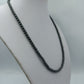 Dunkle Perlenkette grau anthrazit mit goldfarbenem Verschluss elegant