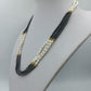 Mehrreihige Perlenkette schwarz weiß gold 43 cm elegant