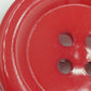 Auffällige Vintage Brosche im originellen Knopf Design in kräftigem Rot