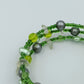 Mehrreihiges Armband grün mit Perlen Steinen verspielt modern