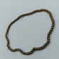 Goldfarbenes Perlenarmband elastisch schlicht elegant