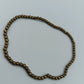 Goldfarbenes Perlenarmband elastisch schlicht elegant