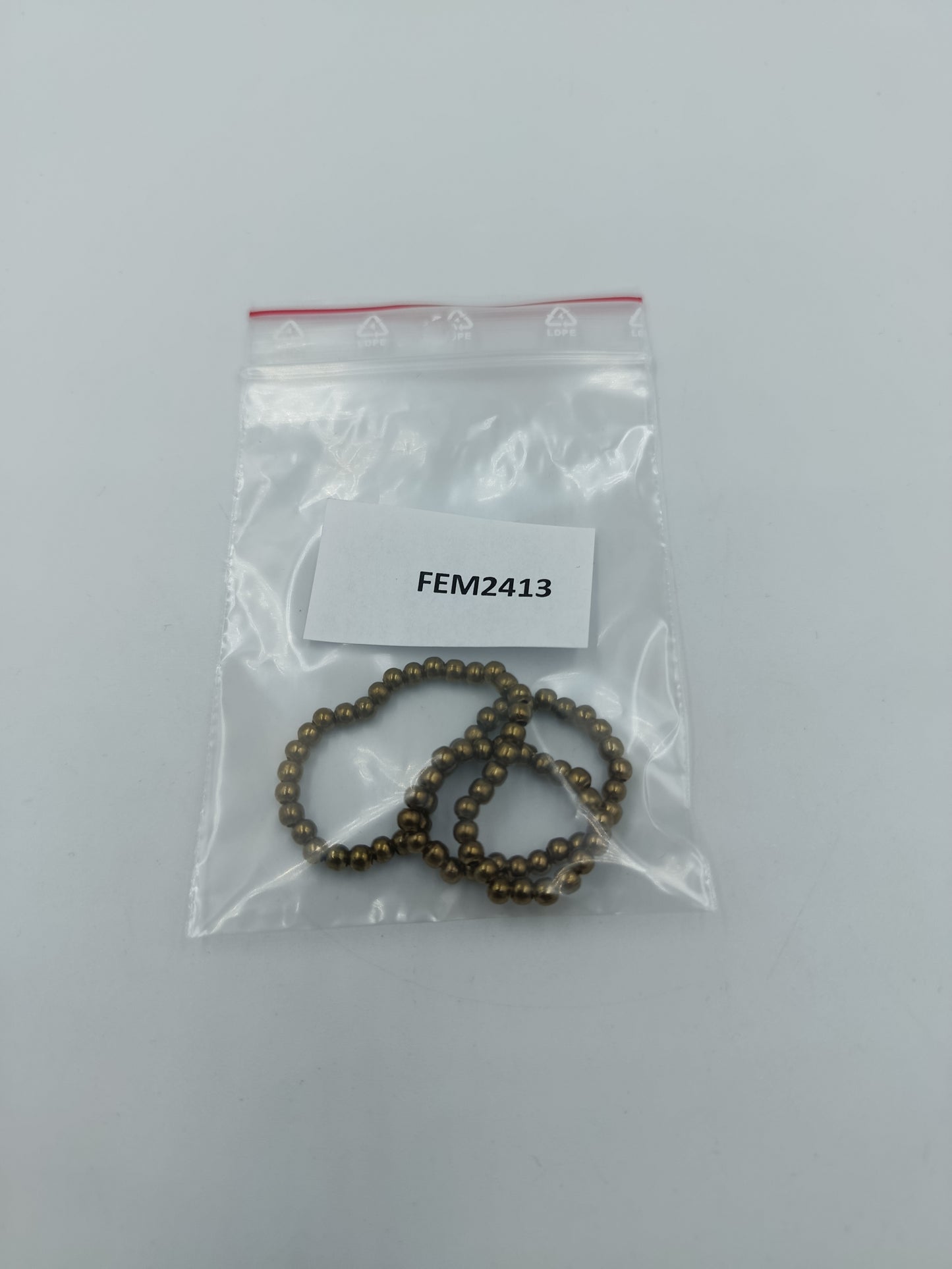 Goldfarbenes Perlenarmband elastisch schlicht elegant