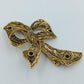 Vintage Brosche Schleife Goldfarben mit dunklen Steinen