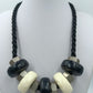 Statement Kette Schwarz Weiß große Elemente Kordel  moderner Design Schmuck